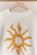 Cozy Knit Sweater with Bold Yellow Sun Patch