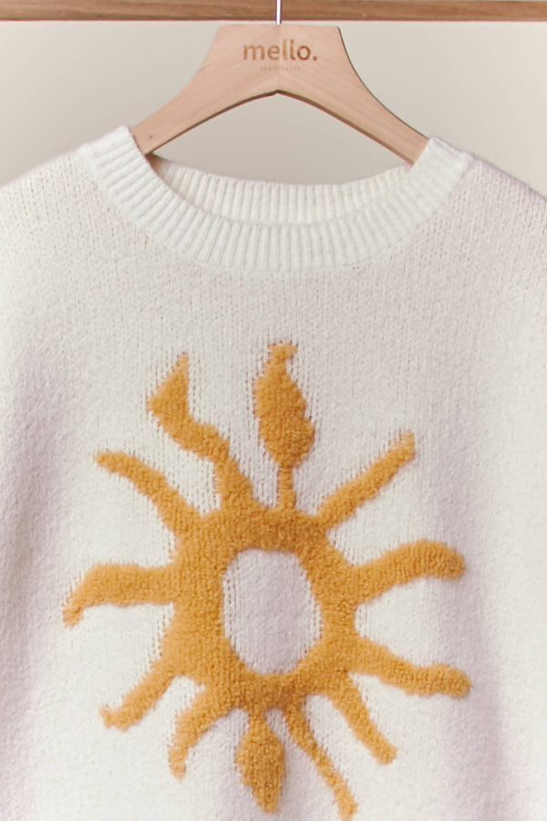 Cozy Knit Sweater with Bold Yellow Sun Patch
