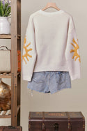 Cozy Knit Sweater with Bold Yellow Sun Patch